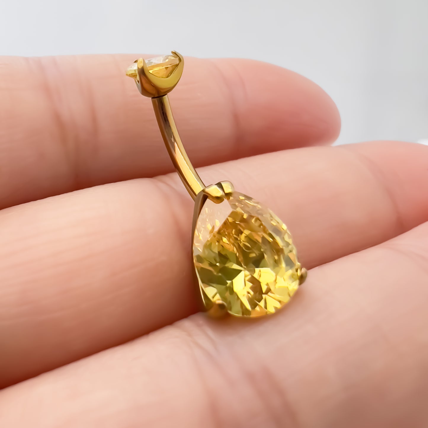 limerencia G23 Titanium Belly Button Rings hypoallergenic medical implant grade 14G Teardrop CZ Belly Navel Rings Piercing Belly Bars(Water drop belly button ring) (Gold + Yellow)