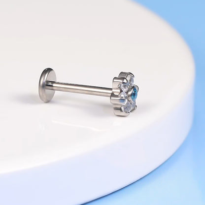 Limerencia F136 チタン 低アレルギー ボディピアス
18G 6mm/8mm/10mm トラガス・ヘリックス・コンク・軟骨・リップ兼用
インプラントグレード 内ネジ式フラットバック ブルーフラワー 1 個入り