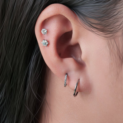 Limerencia F136 チタン 低アレルギー ボディピアス
18G 6mm/8mm/10mm トラガス・ヘリックス・コンク・軟骨・リップ兼用
インプラントグレード 内ネジ式フラットバック ブルーフラワー 1 個入り