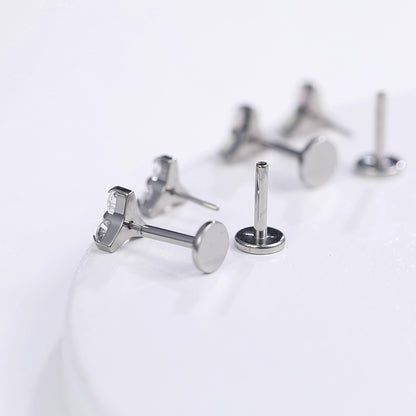Limerencia G23 低アレルギー 18G フラットバックスタッドピアス
F136 インプラントグレードチタン ネジなしワンタッチ式
軟骨・ヘリックス・ラブレット・リップ・モンロー・トラガス ピアス - トリニティ CZ